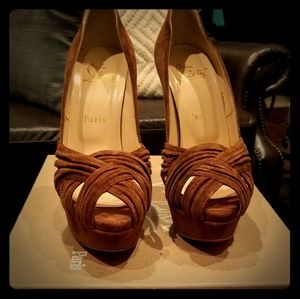 Christian Louboutins , Aborina Sue 150 platforms.